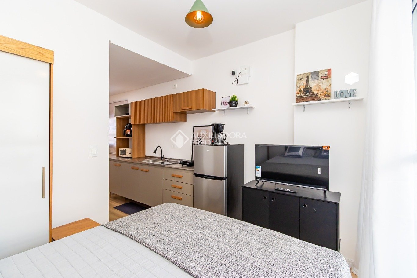 Apartamento com 1 quarto e 27m² à venda em Centro, Curitiba. (3 / 10)